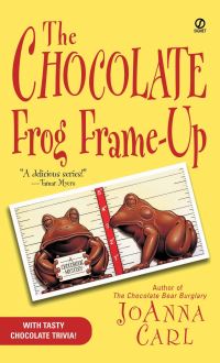 Book Cover for The Chocolate Frog Frame-Up by JoAnna Carl, Copyright Paperback Collection Library of Congress