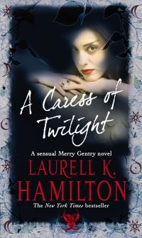 Book Cover for A Caress of Twilight by Laurell K Hamilton